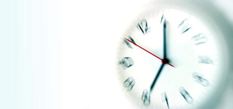 A blurry image of a wall clock